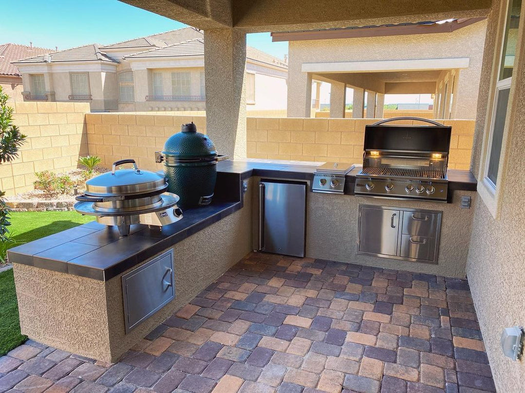 Beat the Heat with this Covered Patio, Built-in Custom Grill Island, and Retractable Glass Walls in Las Vegas