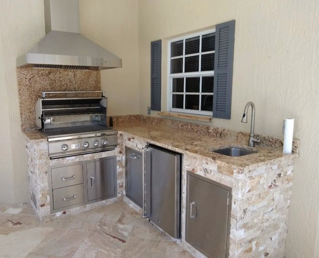 Compact Gourmet Kitchen with Hood with Gorgeous Earth Tones for Year-Round Grilling in Port Charlotte, Florida
