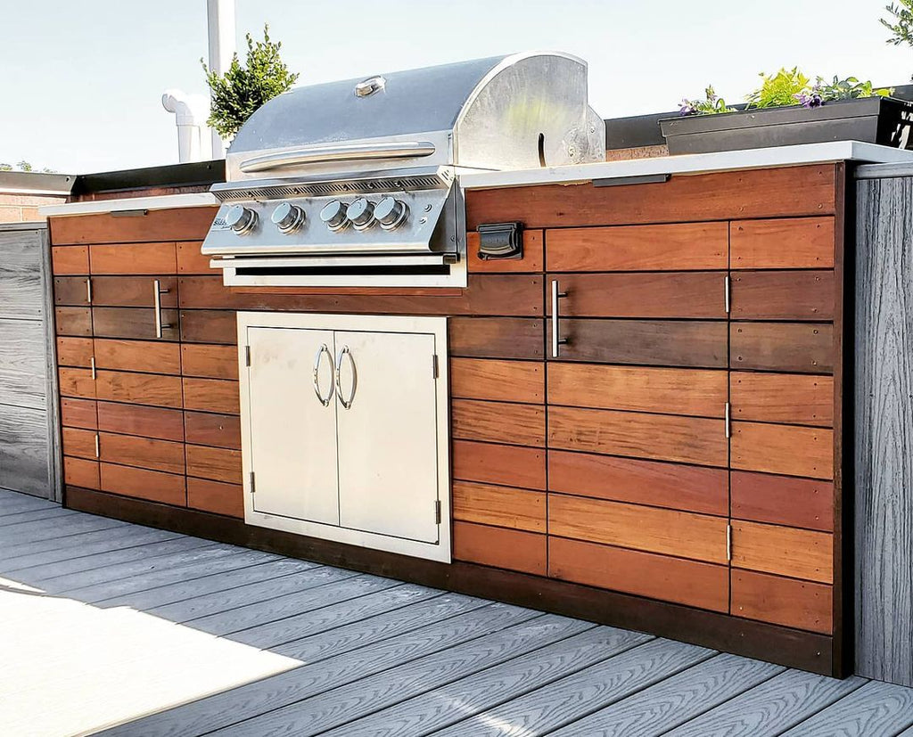 Custom Chicago Rooftop Retreat with Luxurious Hardwood, White Pergola, and Modern Grill Island