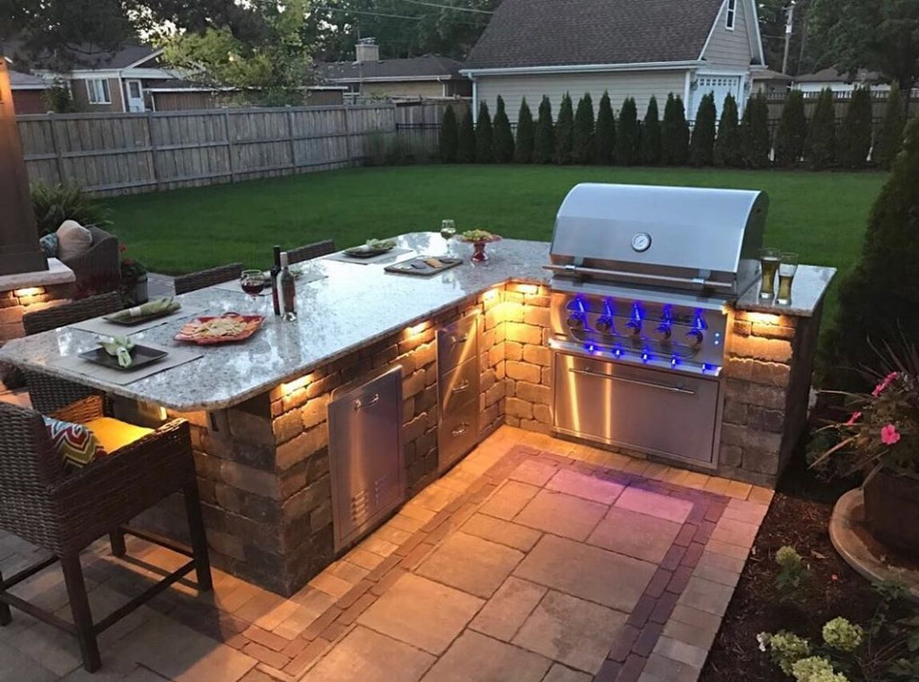 Elegant and Sleek, Stunning Granite Countertop, Moody Accent Lighting, Peaceful Outdoor Dinners at Dusk