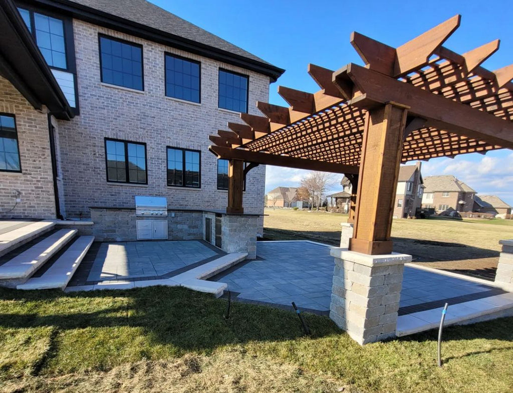 Experience the Charm of Outdoor Living with this Multi-Tiered Paver Patio and Kitchen in Illinois