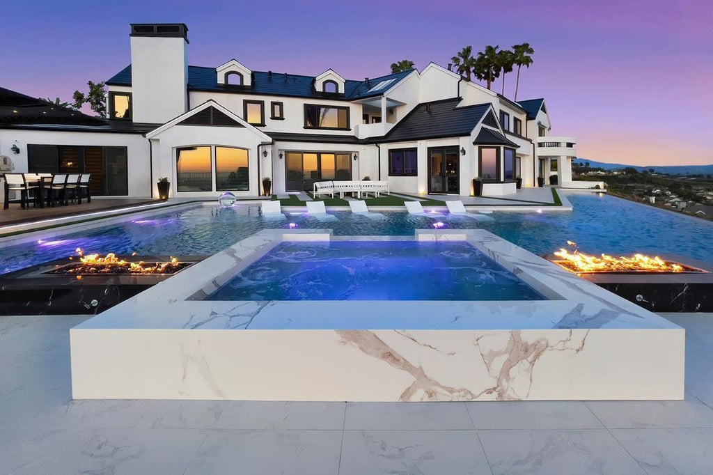 Modern Outdoor Living with a Custom Infinity Pool, Outdoor Kitchen, and Home Theater
