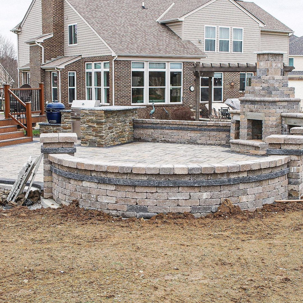 Outdoor Living Makeover in Northern Kentucky with Gorgeous Deck, Huge Paved Patio, and Wood Burning Fireplace.