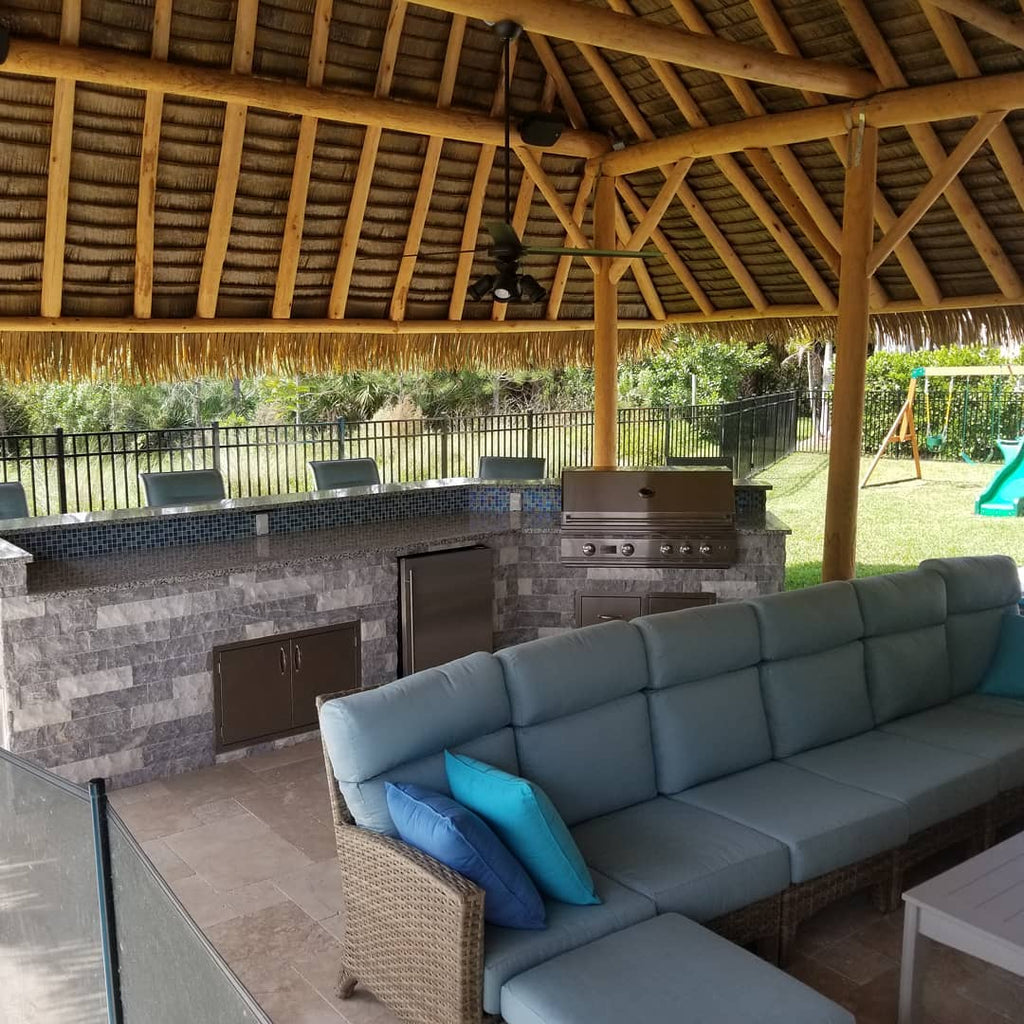 Relaxing and Warm, Thatched Pavilion, Stone Grill Island, Mosaic Backsplash, A Georgia Safari Like No Other