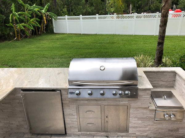 Expansive Outdoor Kitchen, Built-in Custom Fire Pit Area, and Stone Patio in North Florida