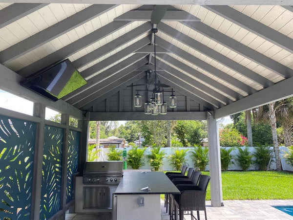 Find Inspiration for Your Backyard Oasis from This Florida Poolside Outdoor Kitchen