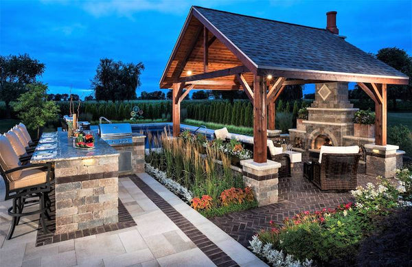 Traditional Pavilion, Rustic Fireplace, and French Charm in a Chicago Retreat