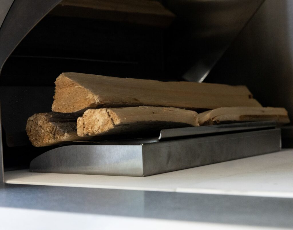 Why a Wood-Burning Outdoor Pizza Oven Still Sets the Standard