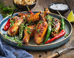 Grilled Chicken Wings with Shishito Peppers and Herbs